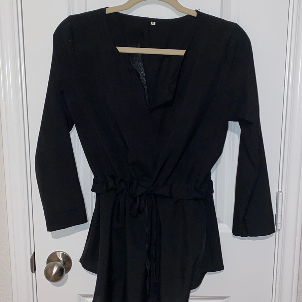 black medium v neck top. cinch at waist is adjustable. SHEIN.